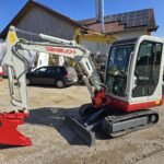 Takeuchi TB 125 avec 3 godets