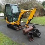 JCB 8016 CTS avec 4 godets