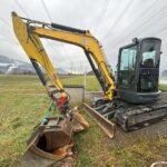 New holland E50B SR avec Accessoires