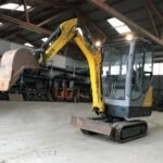 Wacker Neuson 1404 avec 3 godets