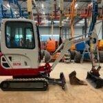 Takeuchi TB216 avec 3 godets
